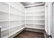Spacious walk-in pantry with custom built-in shelving at 7703 Juniper Ln, Denver, NC 28037