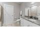 Bathroom with a granite vanity, a shower and tile floors at 859 Academy St, Charlotte, NC 28205