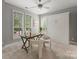 Bedroom with a ceiling fan, natural light, a work desk and a Murphy bed at 859 Academy St, Charlotte, NC 28205