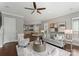 Open-concept living room flows into the kitchen with comfortable seating and a bright atmosphere at 859 Academy St, Charlotte, NC 28205