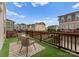 Cozy outdoor area with artificial turf, comfortable seating, and scenic neighborhood views, perfect for relaxation and gatherings at 859 Academy St, Charlotte, NC 28205