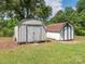 Two sheds provide additional storage space in the backyard, catering to practical needs and offering secure solutions at 876 Stowe Ln, Gastonia, NC 28056