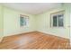 Bright bedroom with natural light and hardwood floors at 9139 Robert Frost Ln, Charlotte, NC 28213