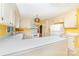 Functional kitchen features white appliances and cabinets, perfect for cooking and meal preparation with modern convenience at 9139 Robert Frost Ln, Charlotte, NC 28213