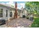 Backyard featuring a stamped concrete patio, well-maintained lawn, and a privacy fence at 936 Knightsbridge Rd, Fort Mill, SC 29708