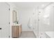 Updated bathroom features a glass enclosed shower and wooden vanity at 936 Knightsbridge Rd, Fort Mill, SC 29708