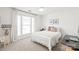 Bright bedroom with large window, neutral carpet, and white walls provides a calm, relaxing space at 936 Knightsbridge Rd, Fort Mill, SC 29708