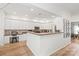 Open kitchen features stainless steel appliances, ample counter space, and hardwood flooring at 936 Knightsbridge Rd, Fort Mill, SC 29708