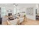 Bright living room features a fireplace, ample natural light, and hardwood floors at 936 Knightsbridge Rd, Fort Mill, SC 29708