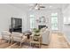 Bright living room features a fireplace, ample natural light, and hardwood floors at 936 Knightsbridge Rd, Fort Mill, SC 29708