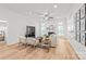 Spacious living room with hardwood floors, fireplace, and plenty of natural light at 936 Knightsbridge Rd, Fort Mill, SC 29708