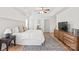 Charming main bedroom with tray ceiling, area rug, and modern furnishings at 936 Knightsbridge Rd, Fort Mill, SC 29708