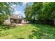 A spacious backyard with a deck, gazebo, and plenty of green space for outdoor activities at 952 8Th Ne St, Hickory, NC 28601