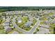 Beautiful aerial view of a neighborhood with mature trees and well-manicured lawns on a sunny day at 1036 Squire Dr, Fort Mill, SC 29707