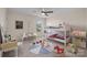 Playful bedroom with a bunk bed, study desk, and plenty of room for creativity and imagination at 1036 Squire Dr, Fort Mill, SC 29707