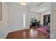 Bright foyer with hardwood floors leading to an office space with natural light at 1036 Squire Dr, Fort Mill, SC 29707