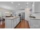 Bright kitchen featuring a large island, stainless steel appliances, and white cabinetry at 1036 Squire Dr, Fort Mill, SC 29707