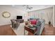 Cozy living room with hardwood floors, a large window, and stylish contemporary furniture at 1036 Squire Dr, Fort Mill, SC 29707