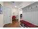 Functional mudroom with custom storage solutions, including a built-in bench, hooks, and a convenient desk area at 1036 Squire Dr, Fort Mill, SC 29707