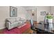 Well-lit office area with stylish decor, and a comfortable sofa and desk setup at 1036 Squire Dr, Fort Mill, SC 29707