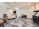 Spacious basement featuring vinyl floors, a TV viewing area, and space for a recreation area at 1056 James Madison Dr, Matthews, NC 28104