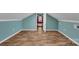 Spacious attic area with unique design, finished floors, and natural light at 111 E Church St, Stanley, NC 28164