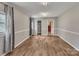 Inviting bedroom featuring hardwood floors, and access to the laundry room through a doorway at 111 E Church St, Stanley, NC 28164