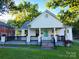 Charming cottage-style home with a welcoming front porch and well-maintained lawn at 111 E Church St, Stanley, NC 28164