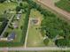 Expansive aerial view of home and property surrounded by lush greenery and trees at 1138 Zeb Haynes Rd, Maiden, NC 28650