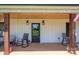 Inviting front porch with rocking chairs and a welcome mat, perfect for relaxing evenings at 1138 Zeb Haynes Rd, Maiden, NC 28650