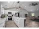 Modern kitchen with white cabinets, an island with a marble countertop, and stainless steel appliances at 1138 Zeb Haynes Rd, Maiden, NC 28650