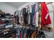 Well-organized walk-in closet with racks for shoes and clothing, optimizing storage space and accessibility at 1138 Zeb Haynes Rd, Maiden, NC 28650