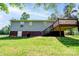 The backyard and deck, with a large lawn, offer a place to entertain at 1170 Scenic Dr, Shelby, NC 28150