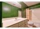 Bright bathroom features a single sink vanity and shower-tub combination with updated fixtures at 1170 Scenic Dr, Shelby, NC 28150