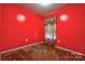 Carpeted bedroom features a window with curtains, providing natural light and privacy at 1170 Scenic Dr, Shelby, NC 28150