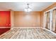 Dining area featuring modern wood-look floors and an open concept, perfect for entertaining at 1170 Scenic Dr, Shelby, NC 28150