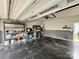 Tidy garage with storage shelves and epoxy floors at 12531 Bryton Ridge Pkwy, Huntersville, NC 28078
