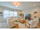 Spacious living room boasts comfortable furniture, modern decor, and ample space for relaxation at 12531 Bryton Ridge Pkwy, Huntersville, NC 28078