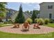 Inviting outdoor lounge area featuring a brick patio and comfortable seating, perfect for relaxation at 12531 Bryton Ridge Pkwy, Huntersville, NC 28078