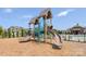 A vibrant playground area featuring modern play structures and a soft wood chip ground at 12531 Bryton Ridge Pkwy, Huntersville, NC 28078