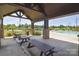 A community poolside pavilion offers picnic tables and scenic views of the pool area at 12531 Bryton Ridge Pkwy, Huntersville, NC 28078