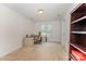 Cozy bedroom with neutral carpet, ample natural light and space for an office at 130 Greenwich Dr, Statesville, NC 28677