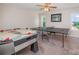 Bonus room with ceiling fan, ping pong table, air hockey table, and natural light at 130 Greenwich Dr, Statesville, NC 28677