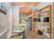 Bright dining area with a charming table setting, adjacent to a well-equipped kitchen and ample storage at 130 Greenwich Dr, Statesville, NC 28677