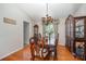 Elegant dining room with hardwood floors, ornate furniture, and a decorative chandelier at 130 Greenwich Dr, Statesville, NC 28677