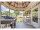 Covered gazebo with grill, view of the backyard, and outdoor dining at 130 Greenwich Dr, Statesville, NC 28677