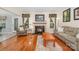 Inviting living room showcasing a fireplace with stylish tile and hardwood flooring at 130 Greenwich Dr, Statesville, NC 28677
