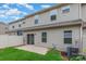 Backyard featuring a concrete patio, grassy area, and fenced perimeter at 138 Lanyard Dr # B, Mooresville, NC 28117