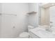 Half bathroom featuring a modern sink and vanity, toilet, and a shelf at 138 Lanyard Dr # B, Mooresville, NC 28117