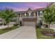 Charming townhome with a two-car garage, inviting entrance, and beautifully landscaped front yard at 138 Lanyard Dr # B, Mooresville, NC 28117